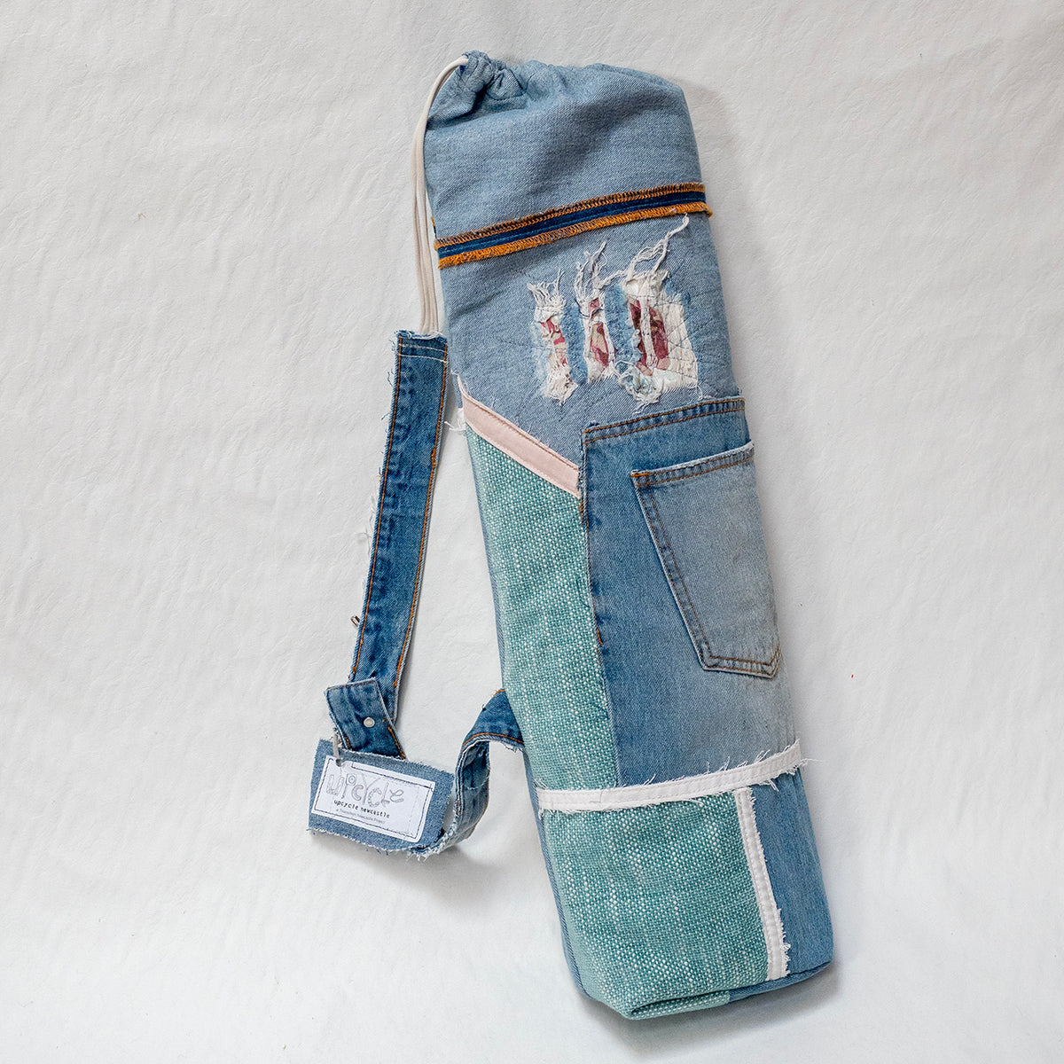 Bag for a yoga mat, handmade from recycled buy jeans.Handmade from Ukraine. Individual design is possible.